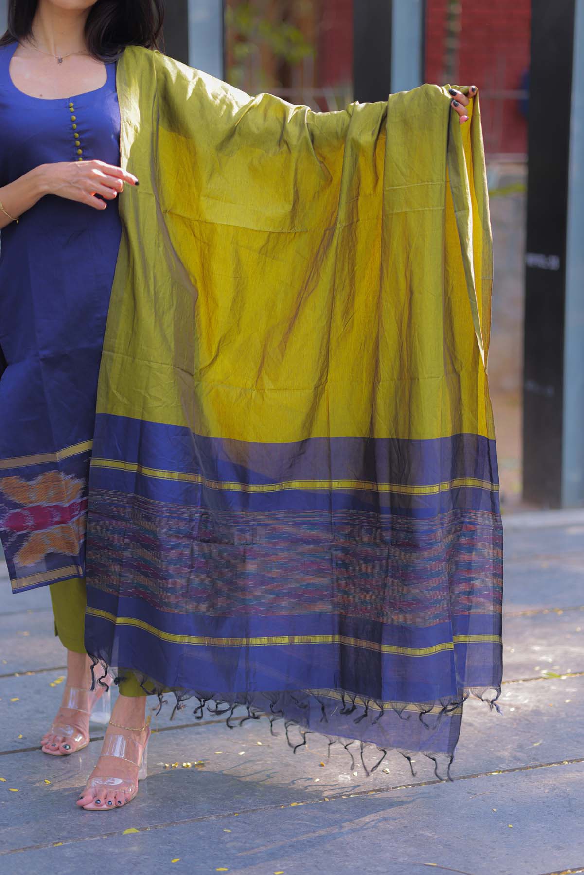 Elegant Ikkat Cotton kurti with pot neck elbow sleeves and potli buttons on the yoke