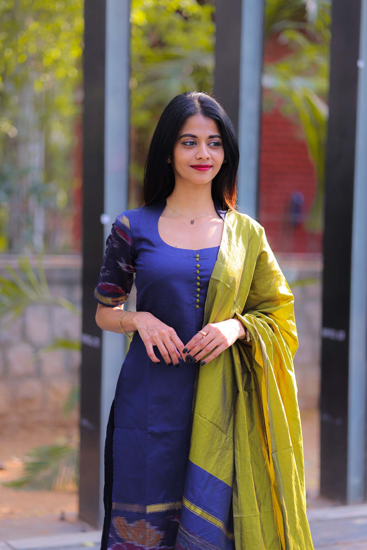 Elegant Ikkat Cotton kurti with pot neck elbow sleeves and potli buttons on the yoke