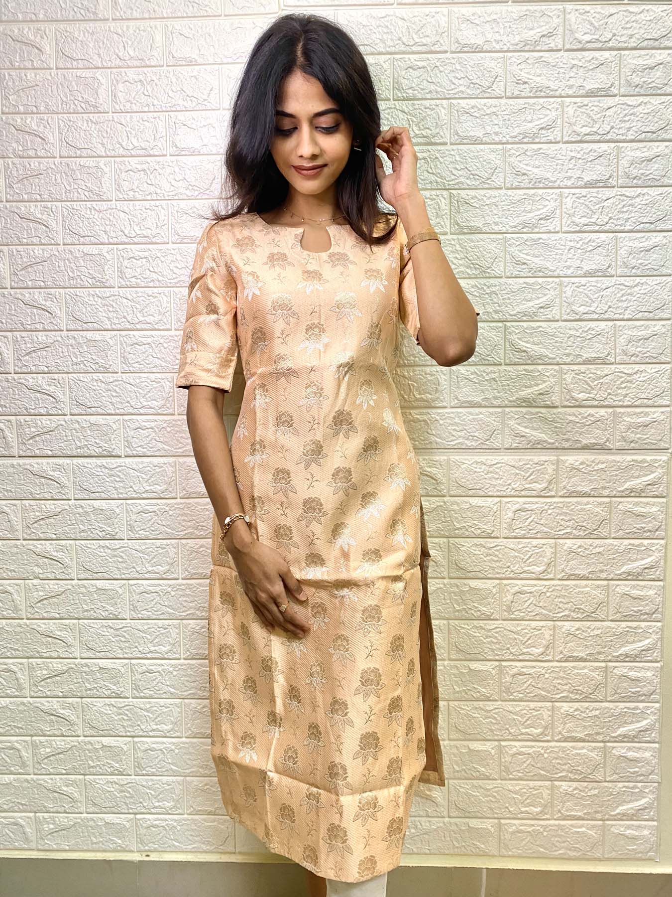 Capturing the timeless elegance of Banaras kurti with elbow sleeves