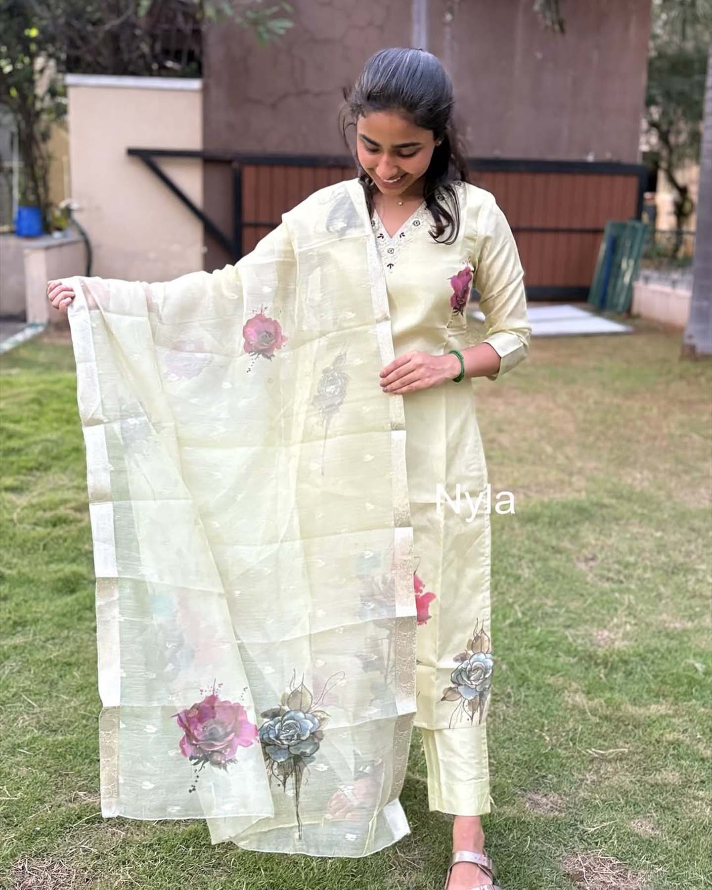 Elegant Tissue Shimmer kurti with embroidery on neck line with 3/4th sleeves