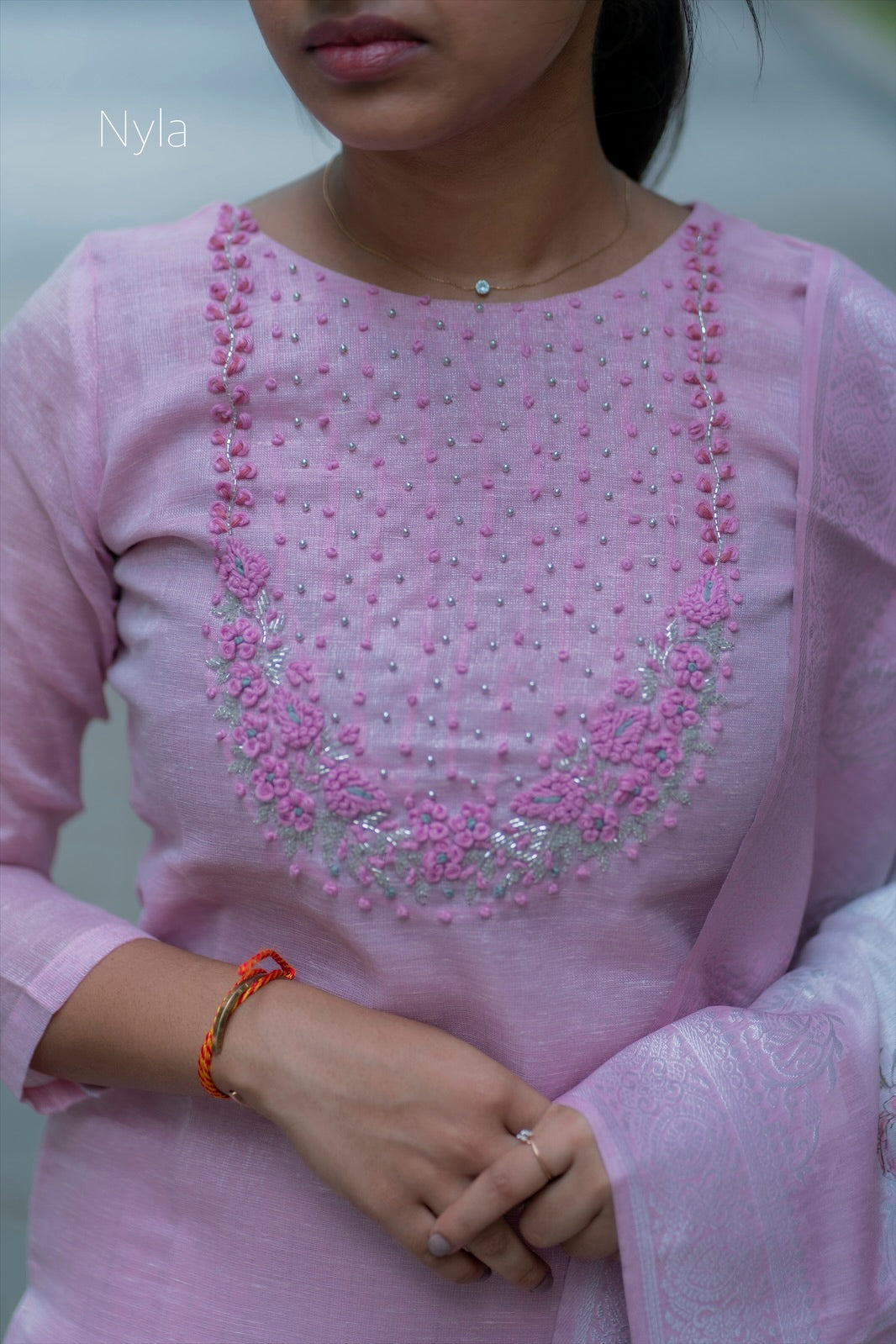 NY 420 Elegant tissue Kurti with  knoted embroidery on yoke and 3/4th sleeves