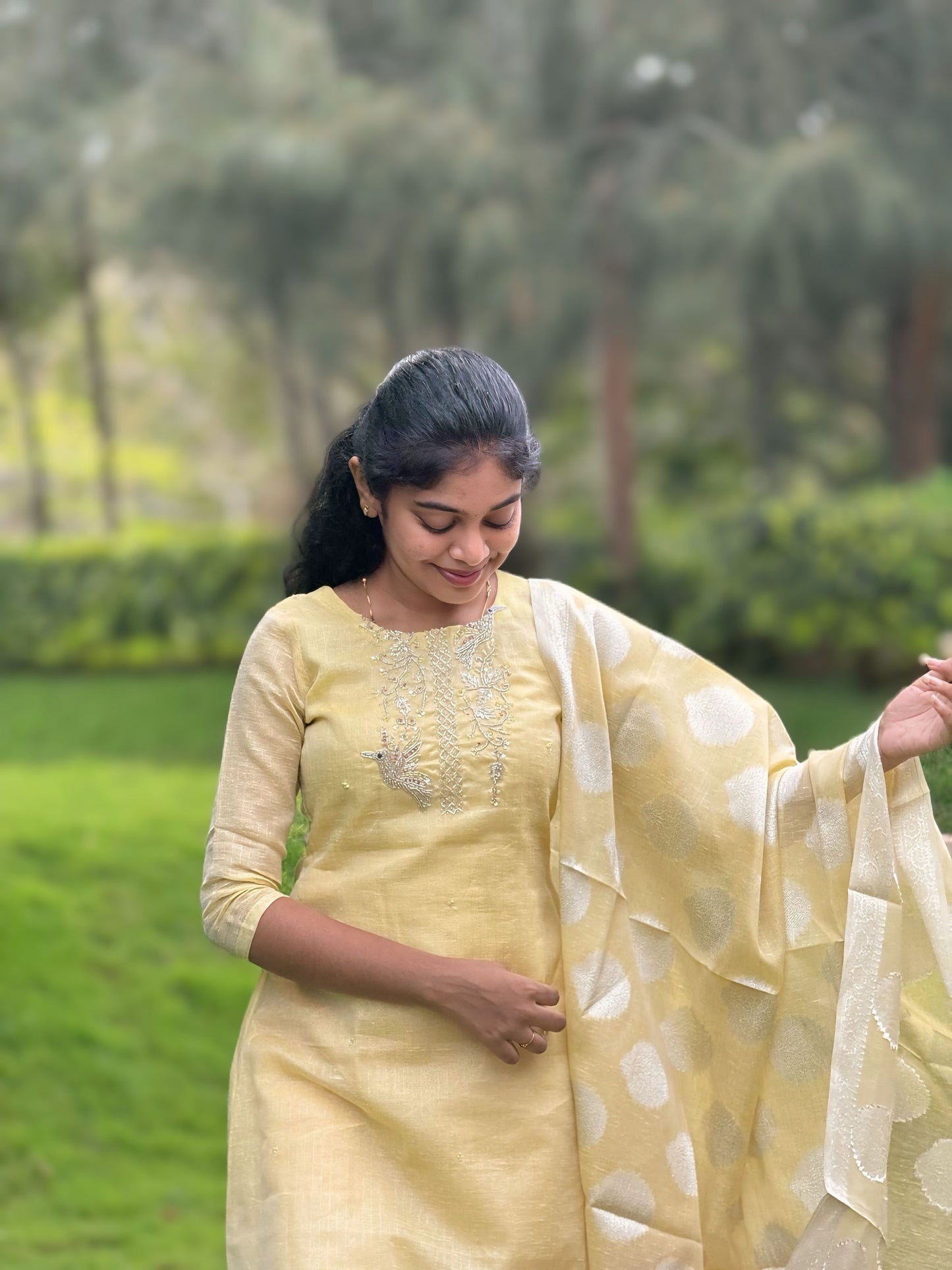 Ny 515 Elegant Tissue silk top with linen look and 3/4th sleeves with beautiful hand embroidery on yoke