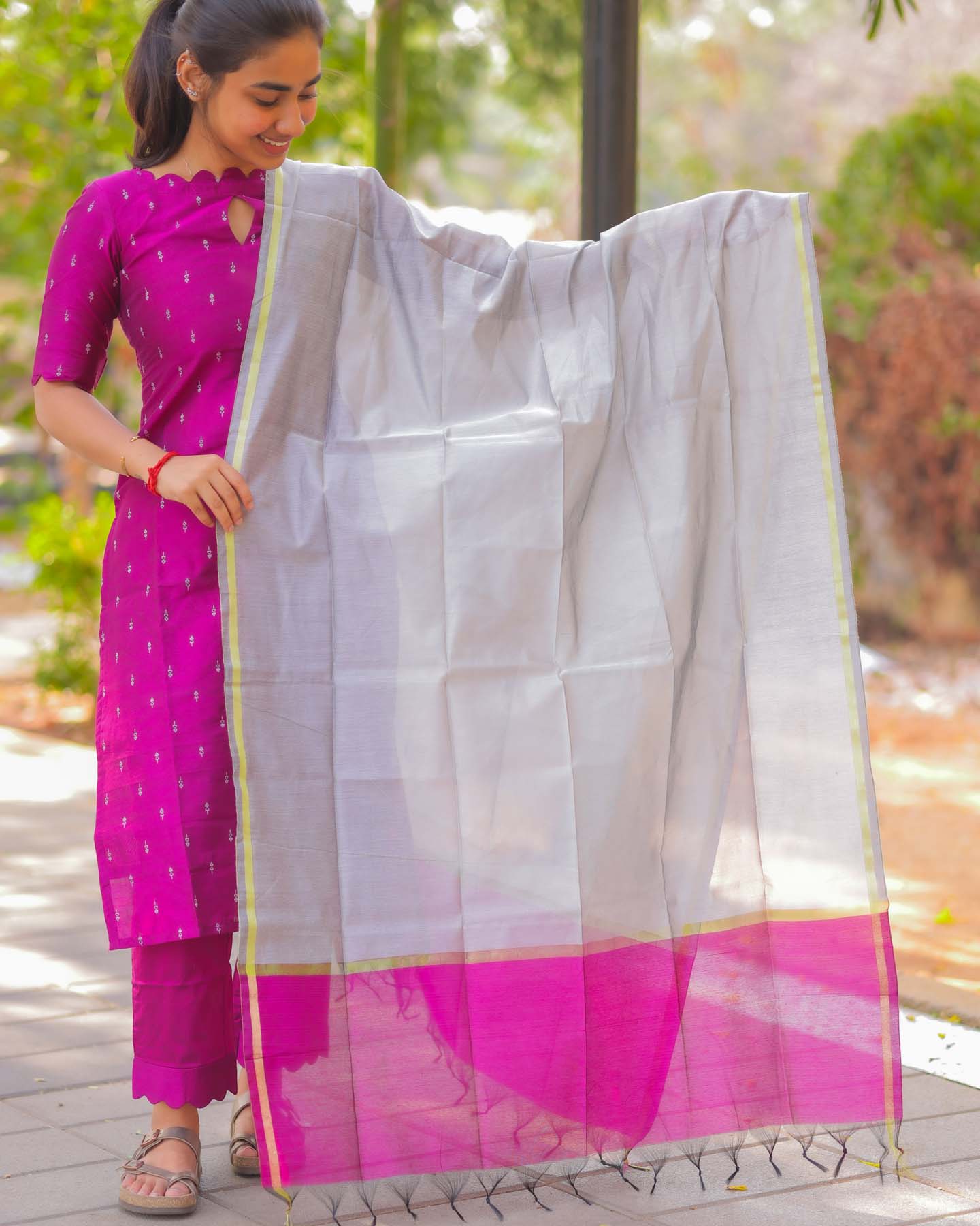Elegant RawSilk  kurti with elbow sleeves and scallop detailings on neck sleeve and pant