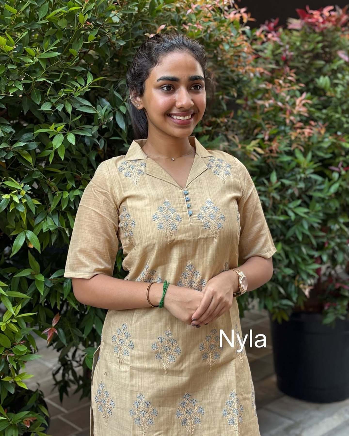 Elegant Banaras Chanderi Cotton kurti with hand embroidery and elbow sleeves