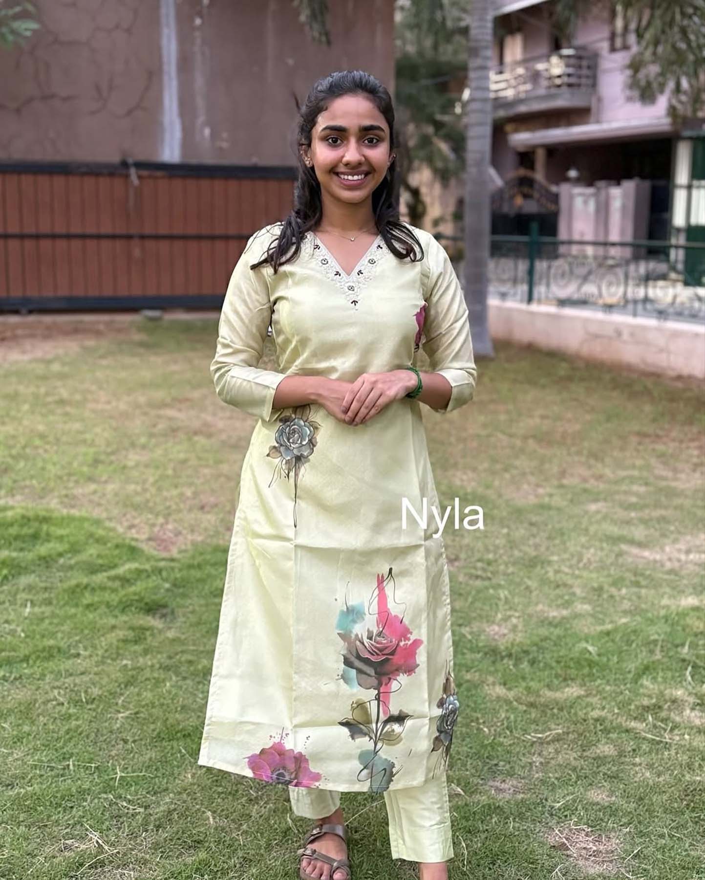 Elegant Tissue Shimmer kurti with embroidery on neck line with 3/4th sleeves