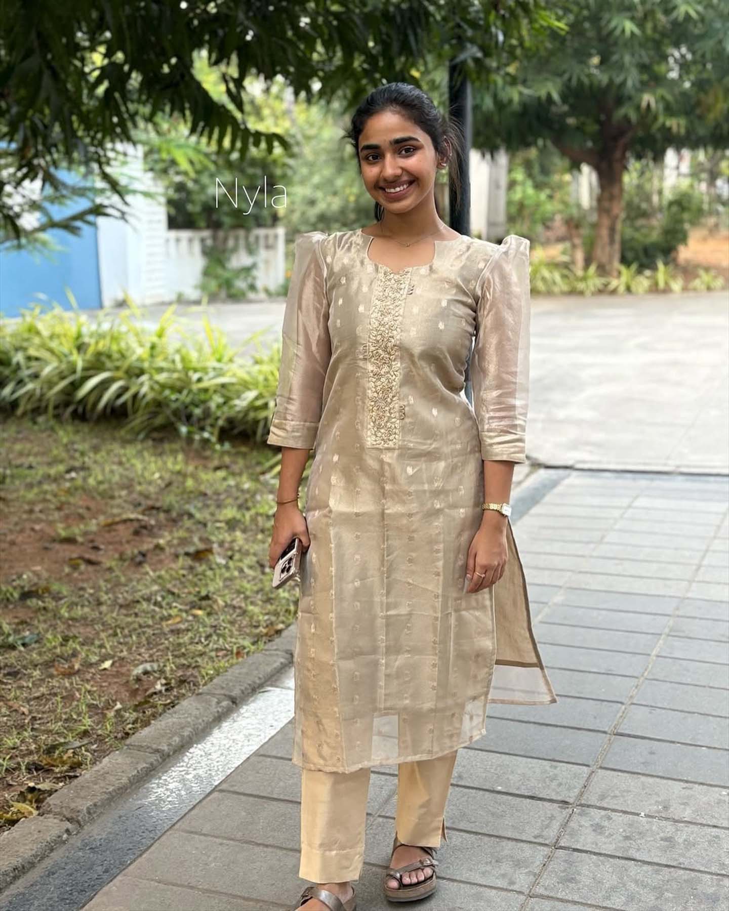Elegant Tissue Shimmer  kurti with embroidery on neck line with 3/4th  puff sleeves