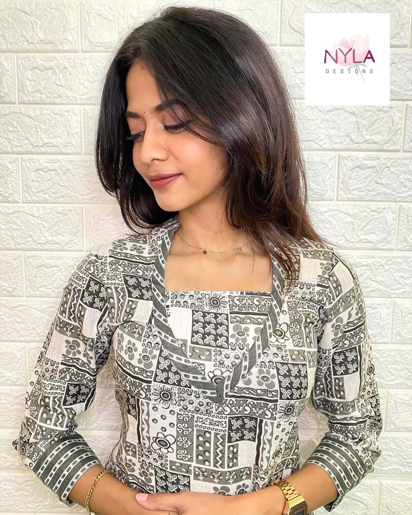 Embrace grace and style with the touch of Soft Rayon kurti set with foil prints and 3/4th sleeves
