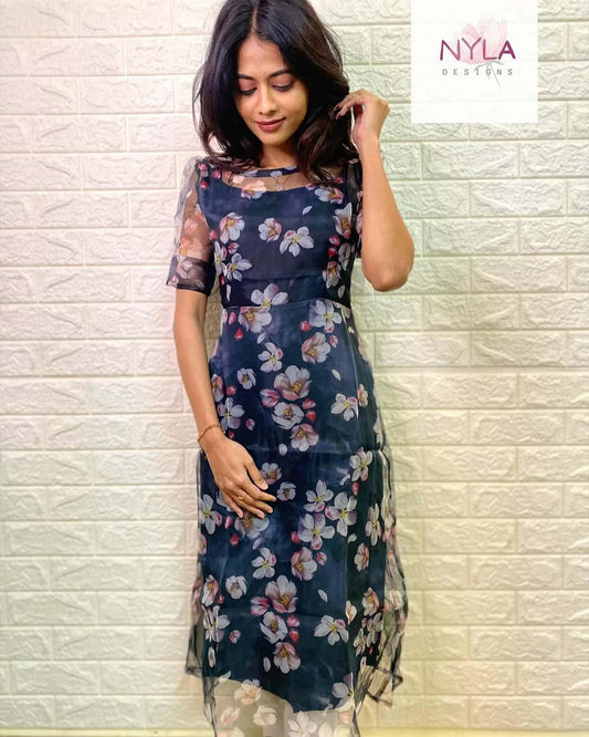 Embrace sheer elegance in this Organza A line kurti with elbow sleeves, where style meets sophistication effortlessly