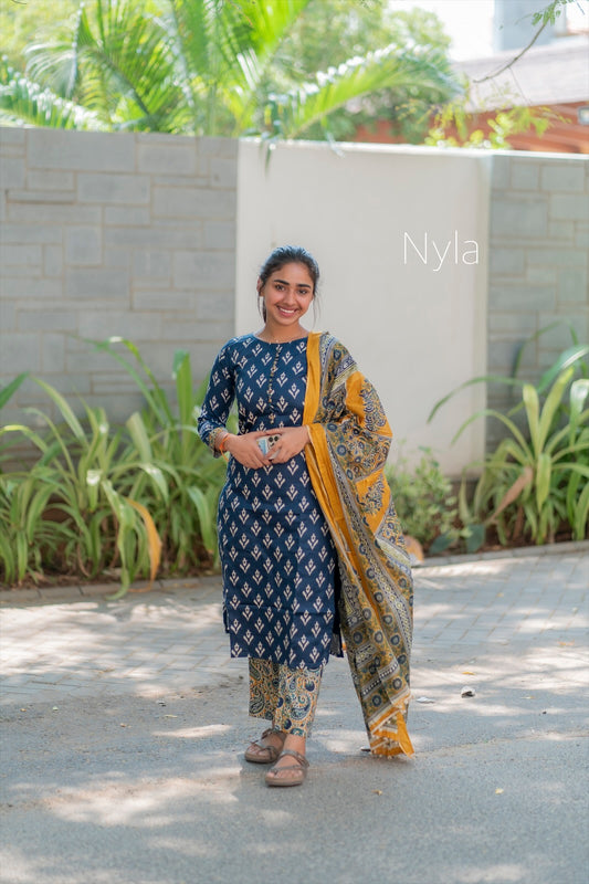 Elegant Silk cotton ikkat print kurti with potli button on yoke and kalamkari bottom and 3/4th sleeves