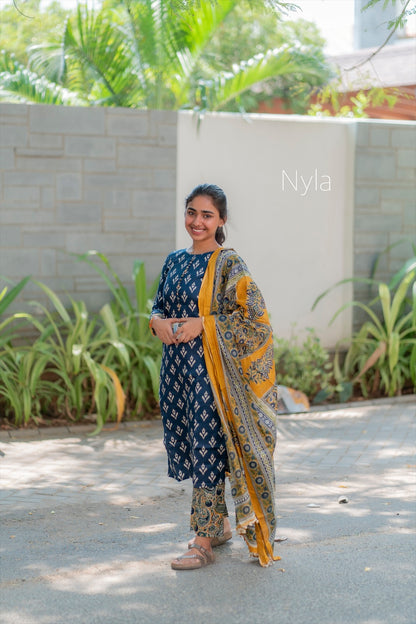 Elegant Silk cotton ikkat print kurti with potli button on yoke and kalamkari bottom and 3/4th sleeves