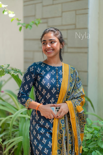Elegant Silk cotton ikkat print kurti with potli button on yoke and kalamkari bottom and 3/4th sleeves